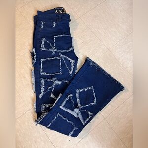 Brand New Jeans XL 13/14 Unique Design. Has Stretch